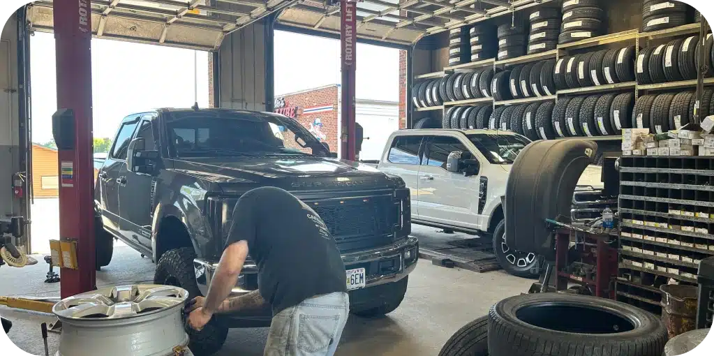 Auto Repair Careers in Missouri & Illinois At Charlie’s Tire and Fast Lube. Tire shop with trucks and equipment